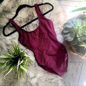 Maroon one piece swim or body suit